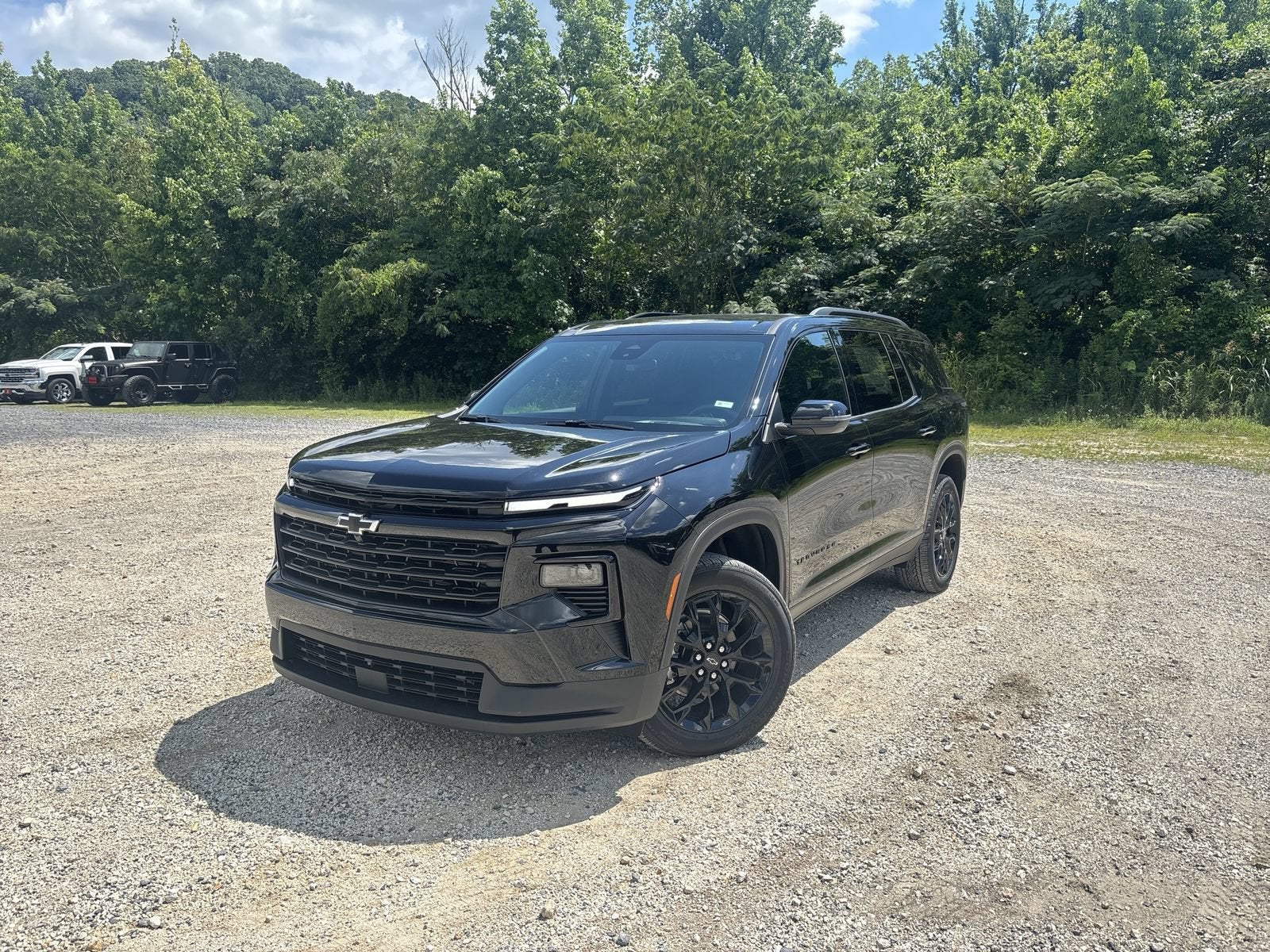 2026 Chevrolet Traverse LT in Mosaic Black Metallic — front three-quarter view
