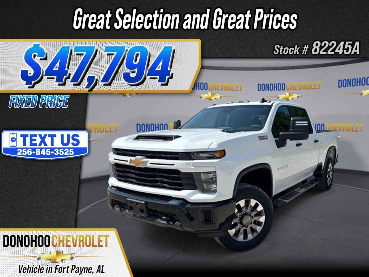 2025 Chevrolet Silverado 2500 HD Custom in Summit White — front three-quarter view