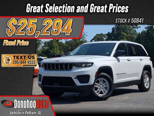 2023 Jeep Grand Cherokee Laredo in Bright White Clearcoat — front three-quarter view