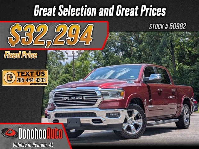 2020 RAM 1500 Laramie in Delmonico Red Pearlcoat — front three-quarter view
