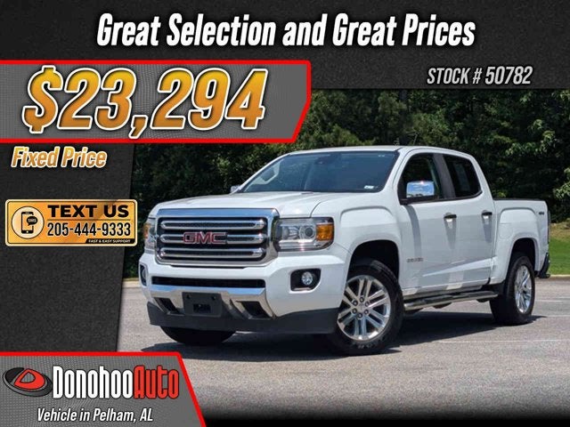 2017 GMC Canyon 4WD SLT in Summit White — front three-quarter view