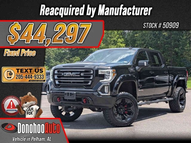 2021 GMC Sierra 1500 AT4 in Onyx Black — front three-quarter view