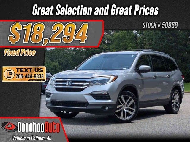 2016 Honda Pilot Touring in Lunar Silver Metallic — front three-quarter view