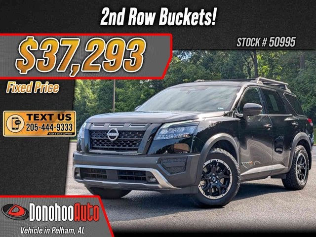 2025 Nissan Pathfinder Rock Creek in Super Black — front three-quarter view